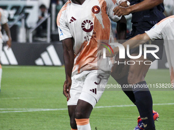 Roma defender Evan N'Dicka (5) and Juventus defender Bremer (3) head the ball during the Serie A football match number 3 between Juventus an...