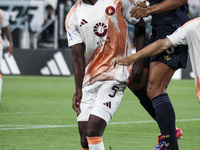 Roma defender Evan N'Dicka (5) and Juventus defender Bremer (3) head the ball during the Serie A football match number 3 between Juventus an...