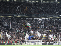 Juventus supporters cheer during the Serie A football match number 3 between Juventus and Roma in Turin, Italy, on September 1, 2024, at the...