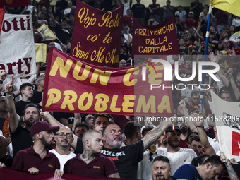 Roma supporters cheer during the Serie A football match number 3, Juventus vs. Roma, in Turin, Piedmont, Italy, on September 1, 2024, at the...