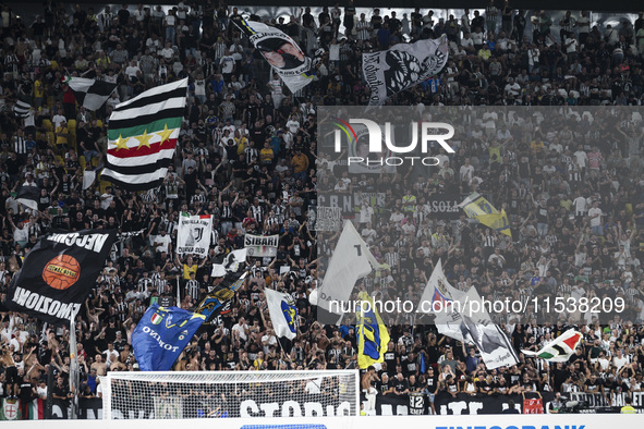 Juventus supporters cheer during the Serie A football match number 3 between Juventus and Roma in Turin, Italy, on September 1, 2024, at the...