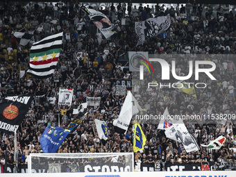 Juventus supporters cheer during the Serie A football match number 3 between Juventus and Roma in Turin, Italy, on September 1, 2024, at the...