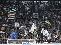 Juventus supporters cheer during the Serie A football match number 3 between Juventus and Roma in Turin, Italy, on September 1, 2024, at the...