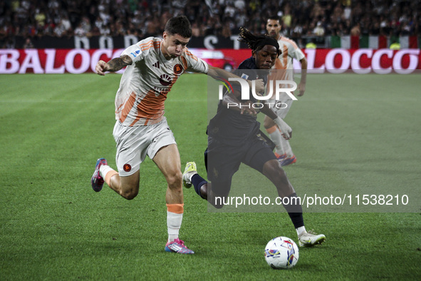 Roma forward Matias Soule (18) fights for the ball against Juventus forward Samuel Mbangula (51) during the Serie A football match number 3...