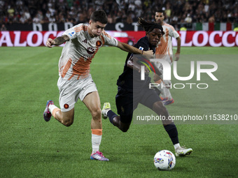 Roma forward Matias Soule (18) fights for the ball against Juventus forward Samuel Mbangula (51) during the Serie A football match number 3...