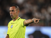 Referee Marco Guida gestures during the Serie A football match number 3 between Juventus and Roma in Turin, Piedmont, Italy, on September 1,...