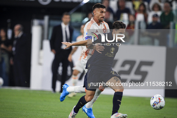 Juventus midfielder Nicolo Fagioli (21) fights for the ball against Roma midfielder Lorenzo Pellegrini (7) during the Serie A football match...