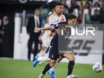 Juventus midfielder Nicolo Fagioli (21) fights for the ball against Roma midfielder Lorenzo Pellegrini (7) during the Serie A football match...