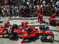 A car of Carlos Sainz of Ferrari is seen in front of a garage ahead of the Italian Formula One Grand Prix at Autodromo Nazionale Monza circu...