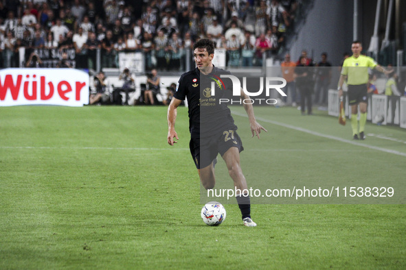 Juventus defender Andrea Cambiaso (27) is in action during the Serie A football match number 3 between Juventus and Roma at the Allianz Stad...