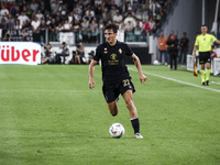 Juventus defender Andrea Cambiaso (27) is in action during the Serie A football match number 3 between Juventus and Roma at the Allianz Stad...