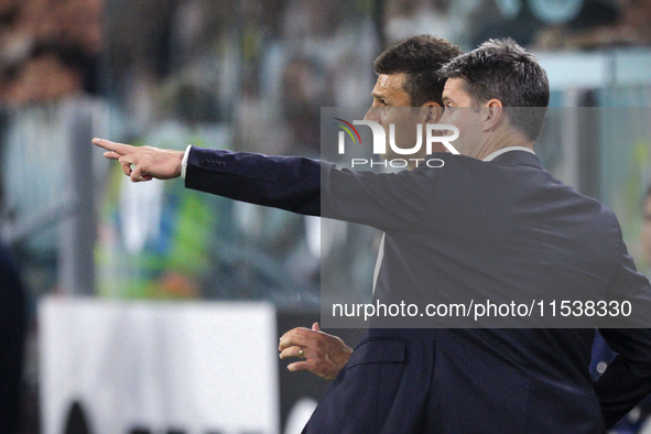 Juventus coach Thiago Motta talks with the Juventus assistant coach during the Serie A football match number 3 between Juventus and Roma in...