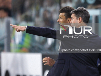 Juventus coach Thiago Motta talks with the Juventus assistant coach during the Serie A football match number 3 between Juventus and Roma in...