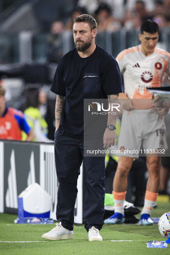 Roma coach Daniele De Rossi looks on during the Serie A football match number 3 between Juventus and Roma in Turin, Piedmont, Italy, on Sept...