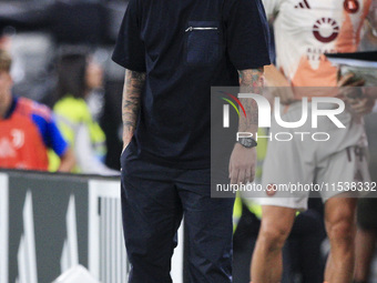 Roma coach Daniele De Rossi looks on during the Serie A football match number 3 between Juventus and Roma in Turin, Piedmont, Italy, on Sept...