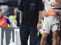 Roma coach Daniele De Rossi looks on during the Serie A football match number 3 between Juventus and Roma in Turin, Piedmont, Italy, on Sept...