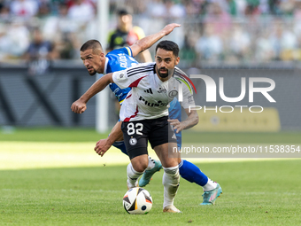 Sebastian Rudol , Luquinhas  during PKO Ekstraklasa match Legia Warsaw vs Motor Lublin in Warsaw, Poland on 01 September, 2024. (