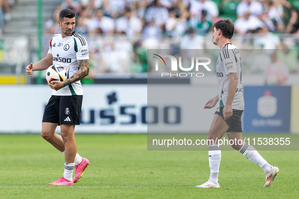 Pawel Wszolek , Migouel Alfarela during PKO Ekstraklasa match Legia Warsaw vs Motor Lublin in Warsaw, Poland on 01 September, 2024. 