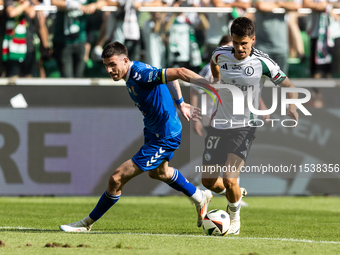 Kaan Caliskaner , Bartosz Kapustka during PKO Ekstraklasa match Legia Warsaw vs Motor Lublin in Warsaw, Poland on 01 September, 2024. (