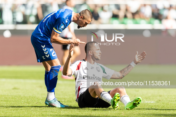 Sebastian Rudol , Tomas Pekhart during PKO Ekstraklasa match Legia Warsaw vs Motor Lublin in Warsaw, Poland on 01 September, 2024. 