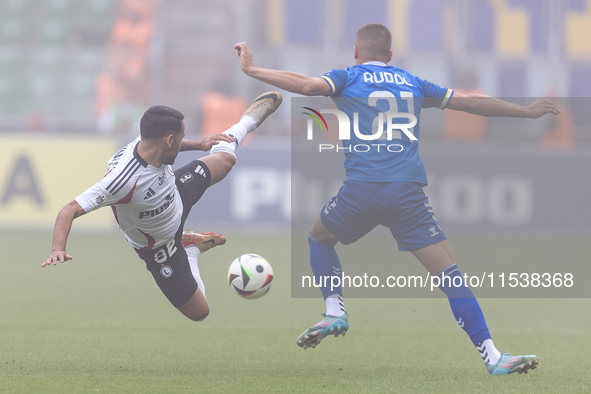 Luquinhas , Sebastian Rudol during PKO Ekstraklasa match Legia Warsaw vs Motor Lublin in Warsaw, Poland on 01 September, 2024. 