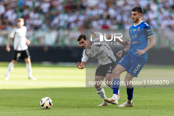 Migouel Alfarela , Kaan Caliskaner during PKO Ekstraklasa match Legia Warsaw vs Motor Lublin in Warsaw, Poland on 01 September, 2024. 