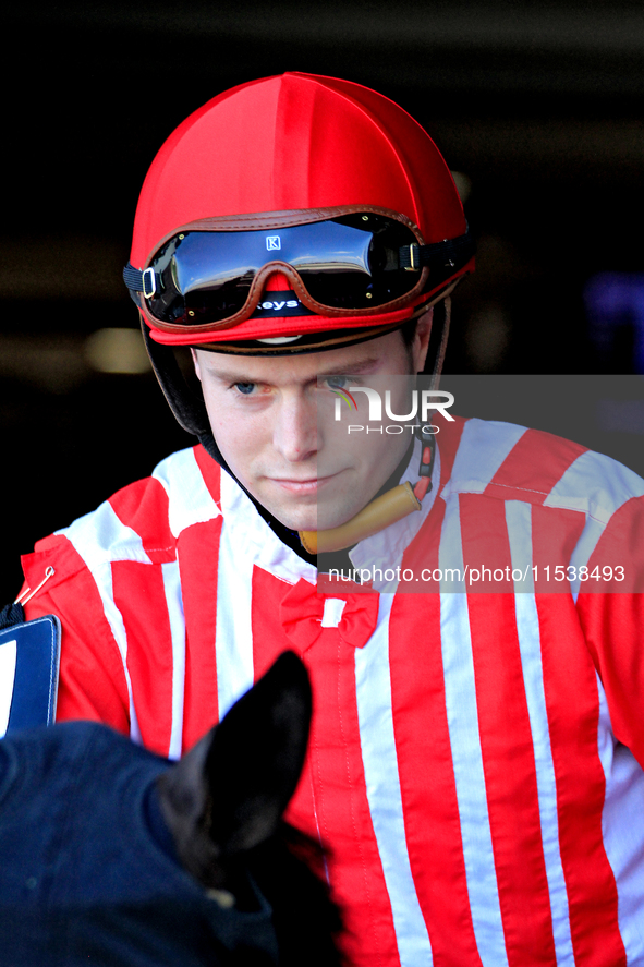 Jockey Austin Adams leaves the paddock on Morning Holiday ahead of the first race at Woodbine Racetrack in Toronto, Canada, on September 1,...