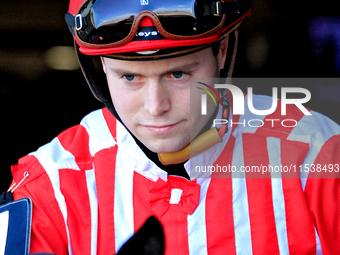 Jockey Austin Adams leaves the paddock on Morning Holiday ahead of the first race at Woodbine Racetrack in Toronto, Canada, on September 1,...