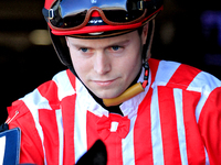 Jockey Austin Adams leaves the paddock on Morning Holiday ahead of the first race at Woodbine Racetrack in Toronto, Canada, on September 1,...