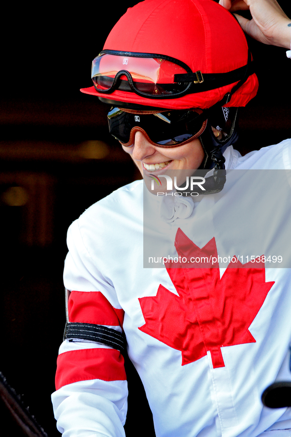 Jockey Cheyenne Kerr leaves the paddock ahead of the first race at Woodbine Racetrack in Toronto, Canada, on September 1, 2024. 