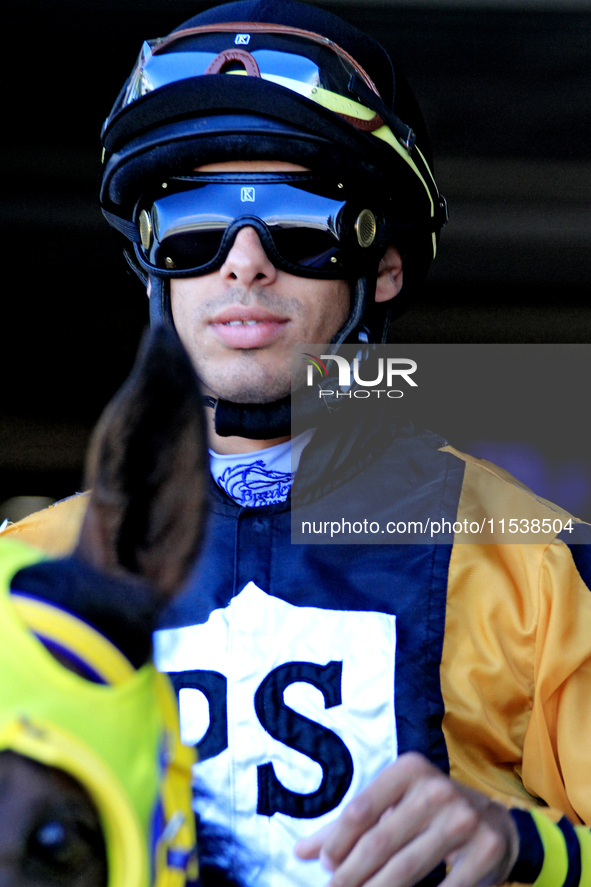 Jockey Jeffrey Alderson leaves the paddock ahead of the first race at Woodbine Racetrack in Toronto, Canada, on September 1, 2024. 