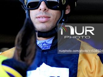 Jockey Jeffrey Alderson leaves the paddock ahead of the first race at Woodbine Racetrack in Toronto, Canada, on September 1, 2024. (