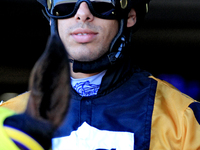 Jockey Jeffrey Alderson leaves the paddock ahead of the first race at Woodbine Racetrack in Toronto, Canada, on September 1, 2024. (