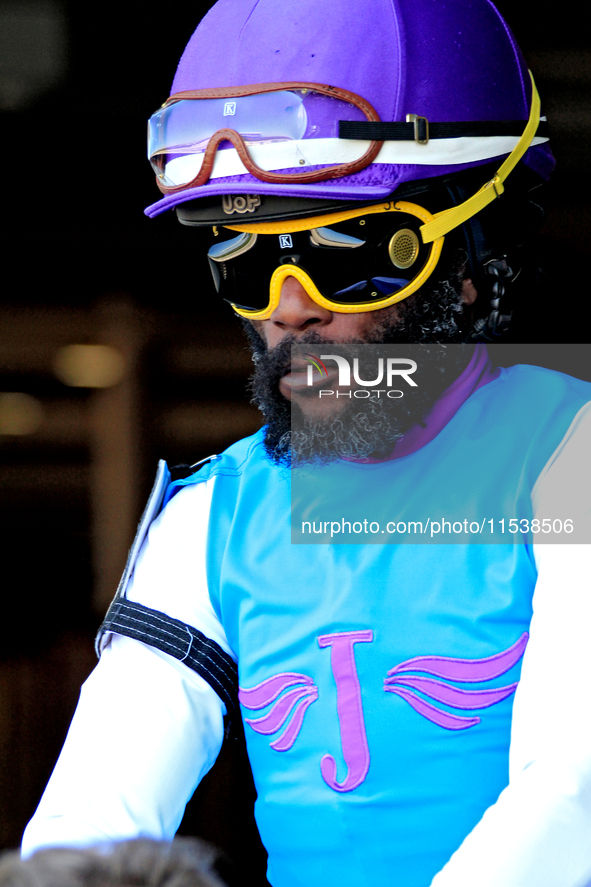 Jockey Juan Crawford leaves the paddock ahead of the first race at Woodbine Racetrack in Toronto, Canada, on September 1, 2024. 