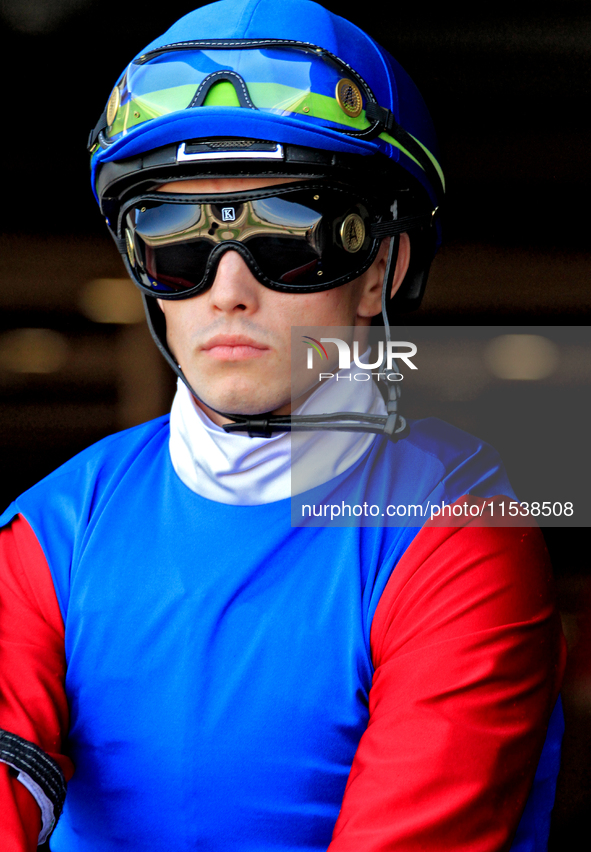 Jockey Fraser Aebly leaves the paddock ahead of the first race at Woodbine Racetrack in Toronto, Canada, on September 1, 2024. 