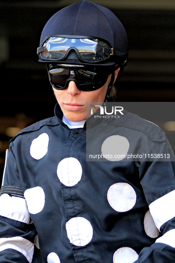 Jockey Emma-Jayne Wilson leaves the paddock ahead of the second race at Woodbine Racetrack in Toronto, Canada, on September 1, 2024. 