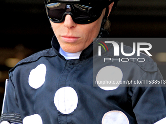 Jockey Emma-Jayne Wilson leaves the paddock ahead of the second race at Woodbine Racetrack in Toronto, Canada, on September 1, 2024. (