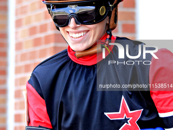 Jockey Sofia Vives leaves the paddock ahead of the second race at Woodbine Racetrack in Toronto, Canada, on September 1, 2024. (