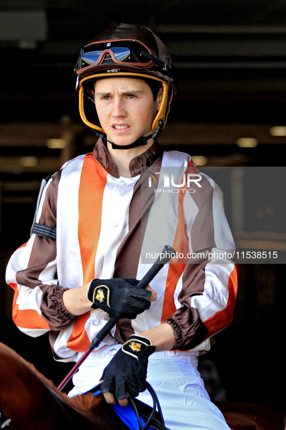 Jockey Pietro Moran leaves the paddock ahead of the second race at Woodbine Racetrack in Toronto, Canada, on September 1, 2024. 