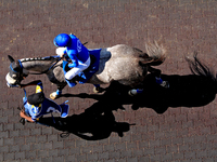 Jockey Emma-Jayne Wilson rides Chipotle Pepper out of the paddock ahead of the third race at Woodbine Racetrack in Toronto, Canada, on Septe...