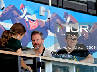 Race fans eat a meal on the Stella Artois Terrace at Woodbine Racetrack in Toronto, Canada, on September 1, 2024. (