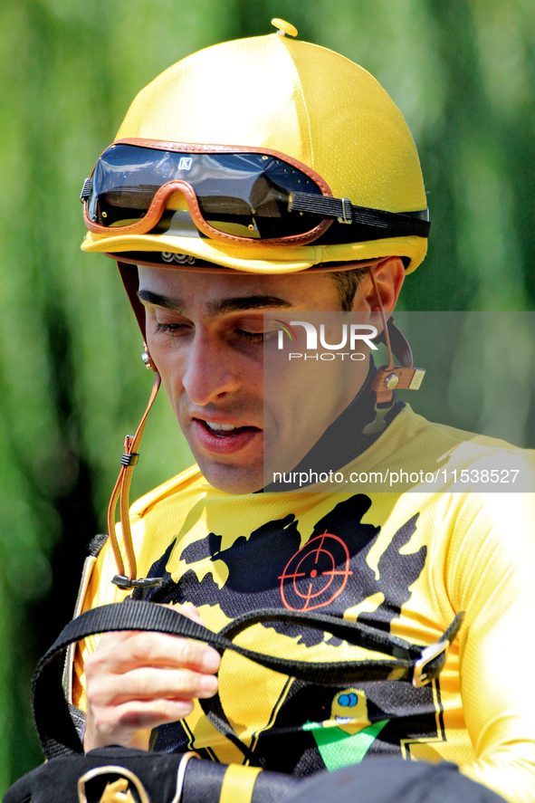 Jockey Leo Salles leaves the paddock ahead of the fourth race at Woodbine Racetrack in Toronto, Canada, on September 1, 2024. 