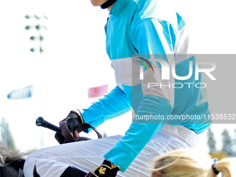 Jockey Pietro Moran rides Ada May to the winner's circle after a win in the fifth race at Woodbine Racetrack in Toronto, Canada, on Septembe...