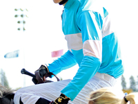 Jockey Pietro Moran rides Ada May to the winner's circle after a win in the fifth race at Woodbine Racetrack in Toronto, Canada, on Septembe...