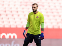 Pau Lopez of Girona FC is in action during the La Liga EA Sports match between Sevilla FC and Girona CF at Nuevo Mirandilla in Seville, Spai...