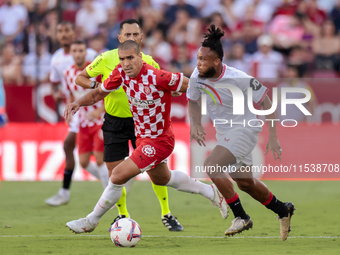 Chidera Ejuke of Sevilla FC runs with the ball during the La Liga EA Sports match between Sevilla FC and Girona CF at Nuevo Mirandilla in Se...