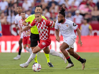 Chidera Ejuke of Sevilla FC runs with the ball during the La Liga EA Sports match between Sevilla FC and Girona CF at Nuevo Mirandilla in Se...