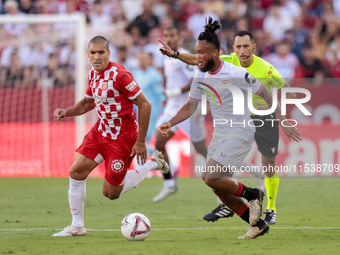 Chidera Ejuke of Sevilla FC runs with the ball during the La Liga EA Sports match between Sevilla FC and Girona CF at Nuevo Mirandilla in Se...