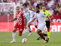 Chidera Ejuke of Sevilla FC runs with the ball during the La Liga EA Sports match between Sevilla FC and Girona CF at Nuevo Mirandilla in Se...