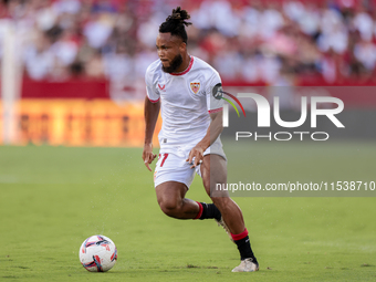 Chidera Ejuke of Sevilla FC runs with the ball during the La Liga EA Sports match between Sevilla FC and Girona CF at Nuevo Mirandilla in Se...